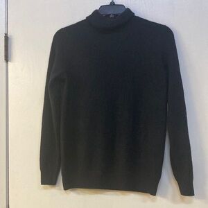 Woman’s  Black Turtleneck Sweater